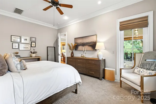 a bedroom with a large bed and furniture