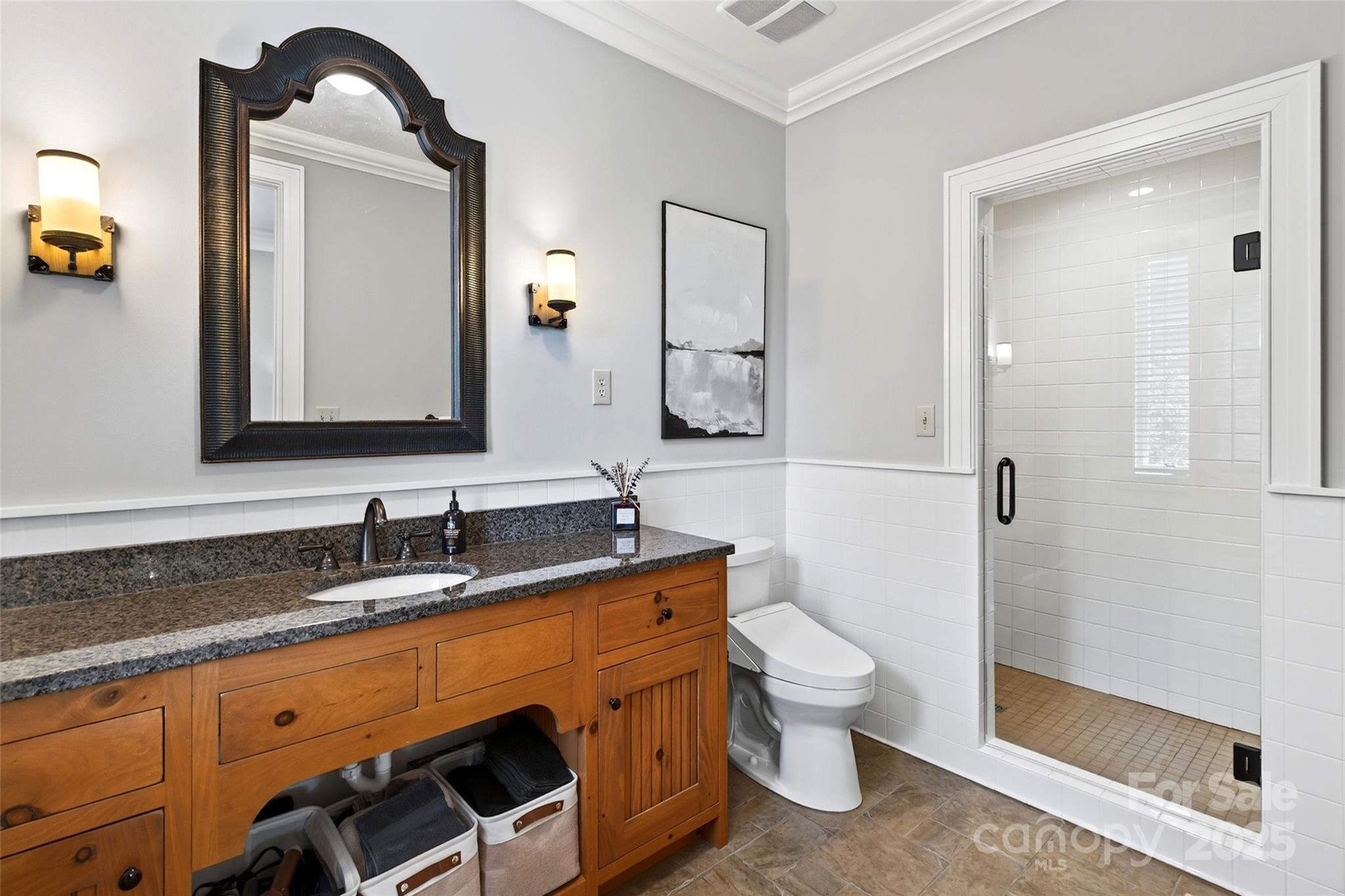 275 Clubhouse, Unit C202 Mill Spring, NC 28756 - Photo 19 of 48 a bathroom with a sink a toilet and shower
