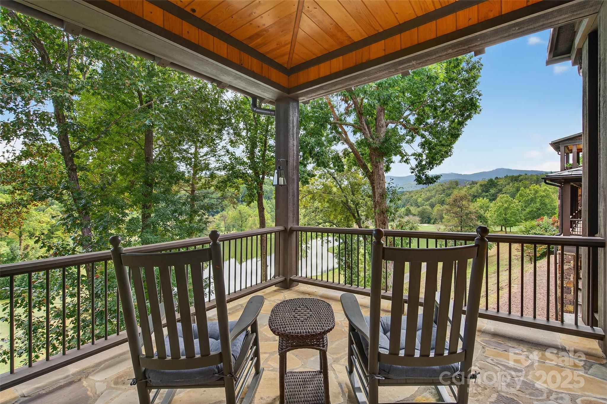 275 Clubhouse, Unit C202 Mill Spring, NC 28756 - Photo 2 of 48 a view of a two chairs in the balcony