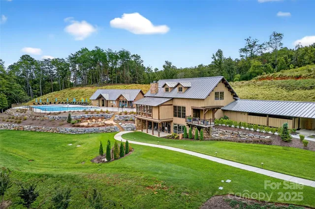 a view of a house with a big yard