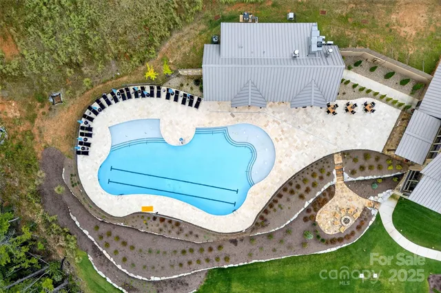 an outdoor sitting area with furniture