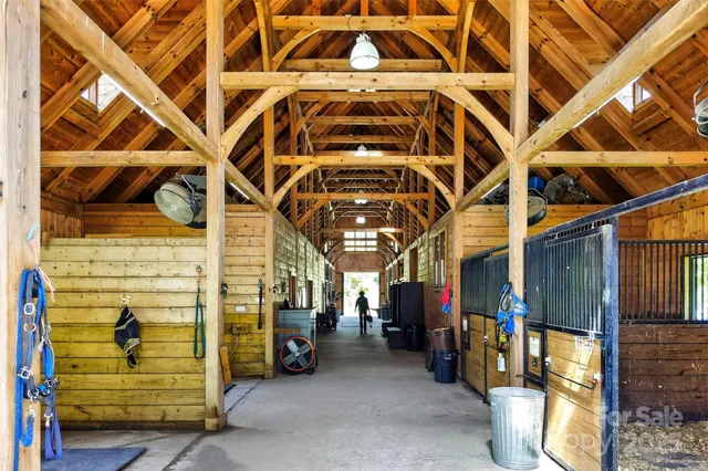 a view of a garage with a white building