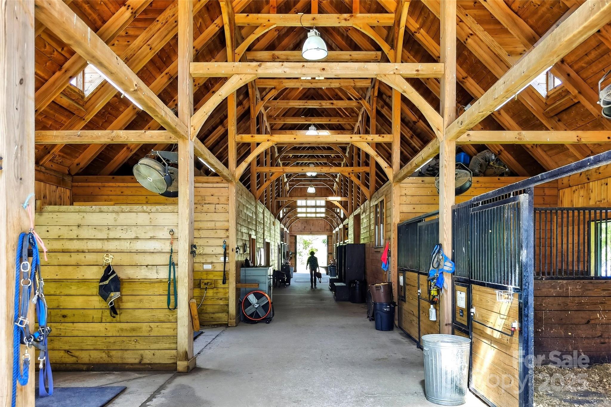 275 Clubhouse, Unit C202 Mill Spring, NC 28756 - Photo 44 of 48 a view of a garage with a white building