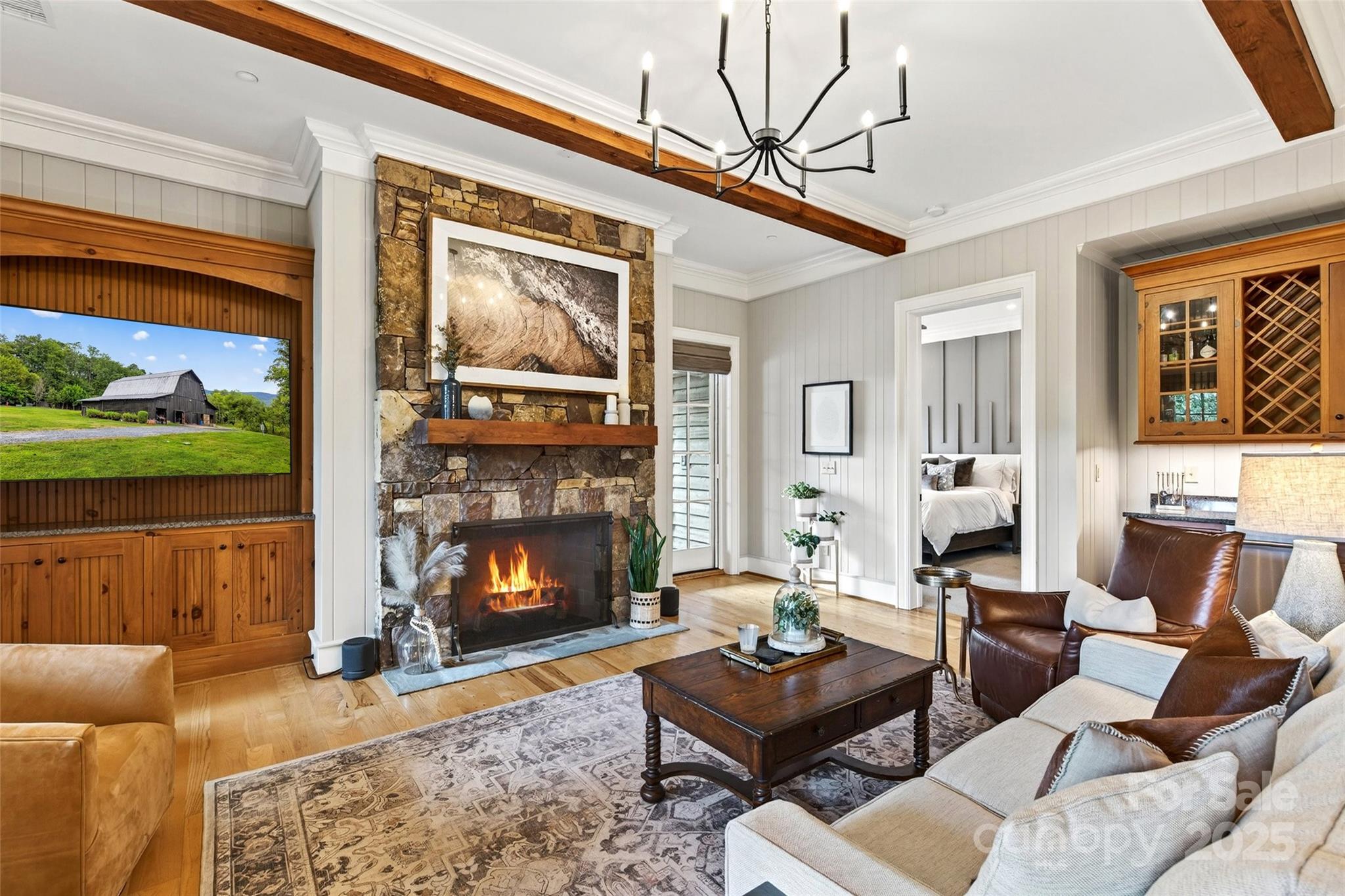 275 Clubhouse, Unit C202 Mill Spring, NC 28756 - Photo 6 of 48 a living room with furniture a fireplace and a window