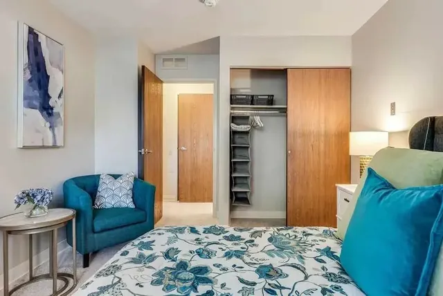 a living room with furniture and a rug