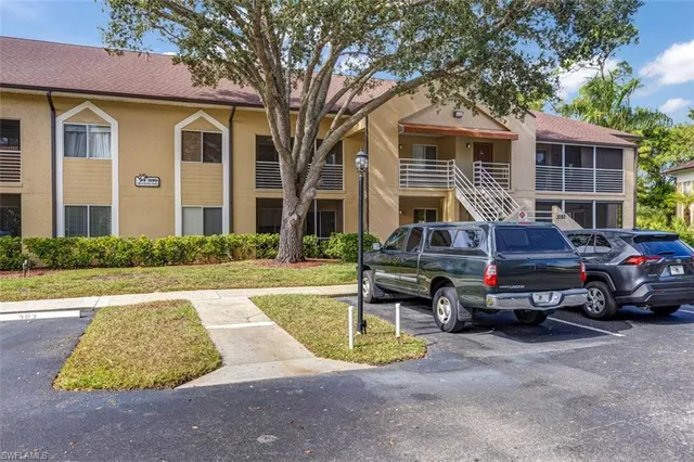 a car parked in front of a house