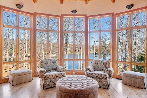 a view of a livingroom with furniture and a fireplace
