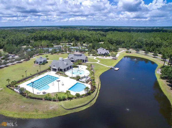 an aerial view of a house with a garden