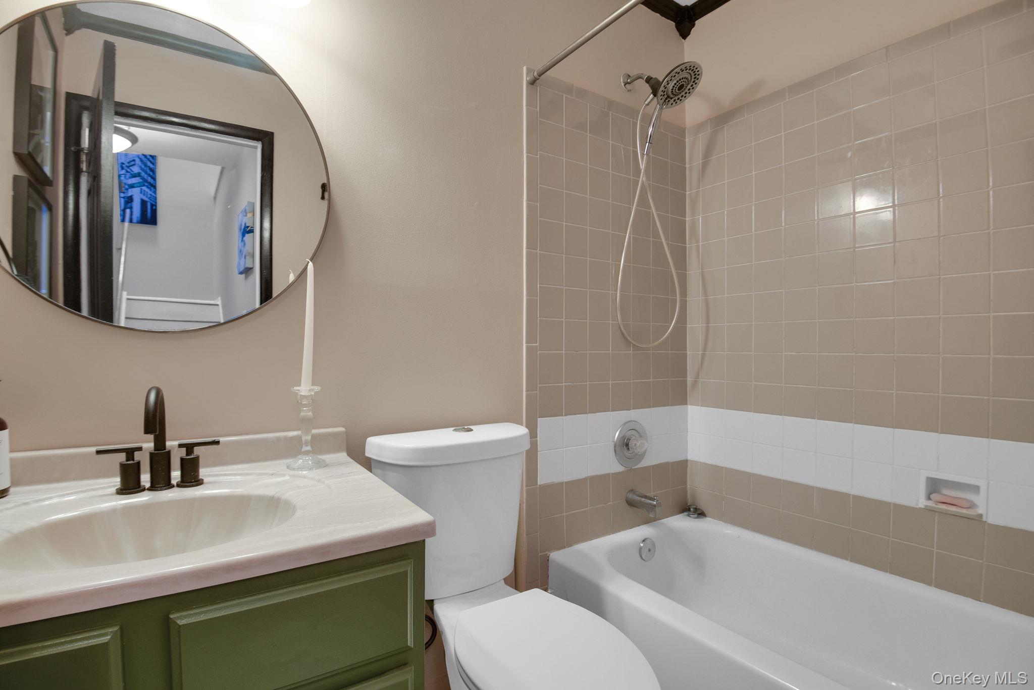 805 Eagles Ridge Road Brewster, NY 10509 - Photo 13 of 22 a bathroom with a sink a toilet and shower