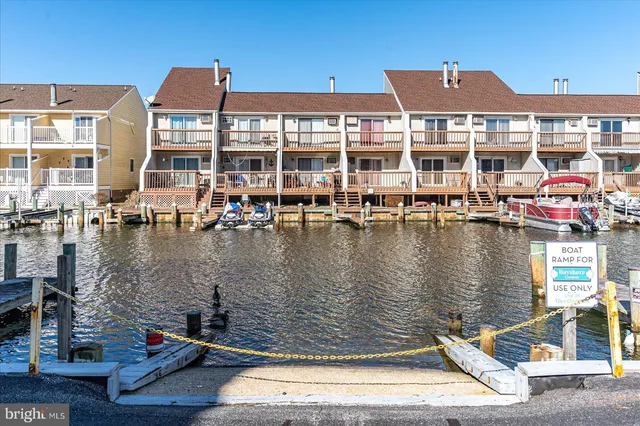 a water fountain covered with buildings