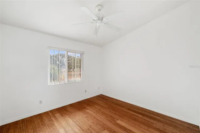 a bathroom with a sink toilet a mirror and shower