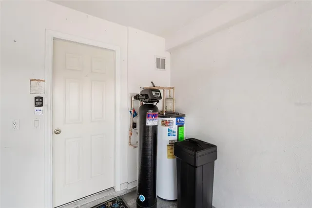 a terrace with dining table & chairs and a table