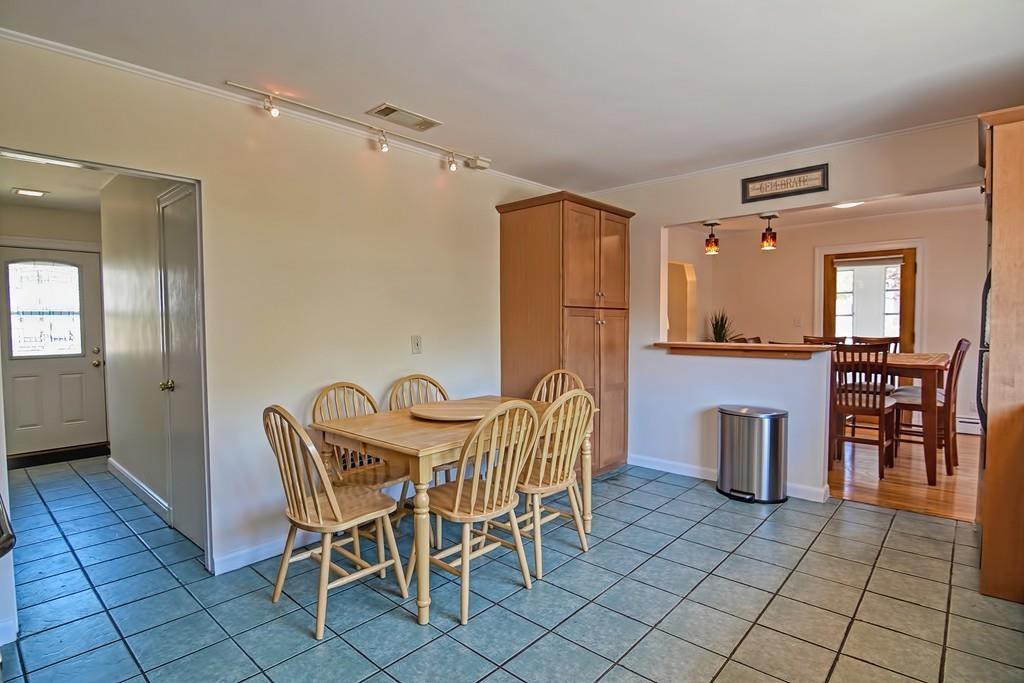 20 Westvale Road Medford, MA 02155 - Photo 19 of 42 a dining room with furniture and chandelier