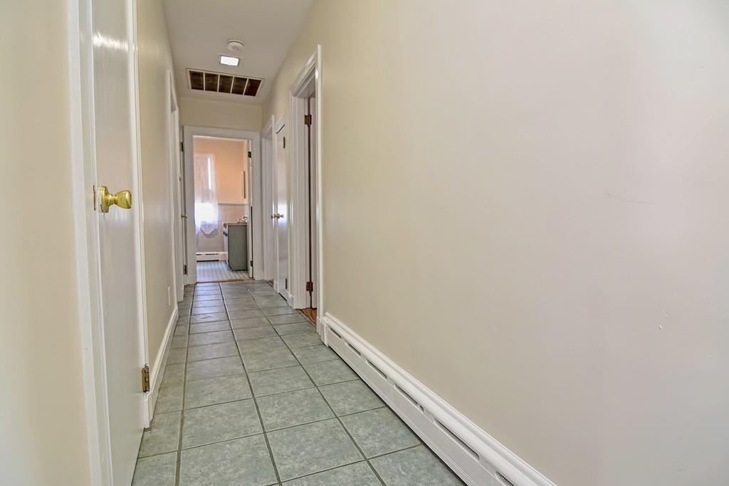 20 Westvale Road Medford, MA 02155 - Photo 21 of 42 a bathroom with a sink and a mirror