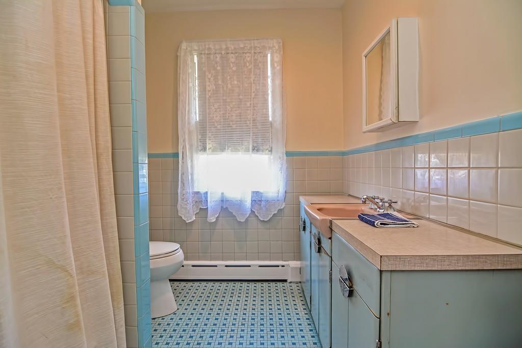 20 Westvale Road Medford, MA 02155 - Photo 25 of 42 a bathroom with a sink toilet and shower