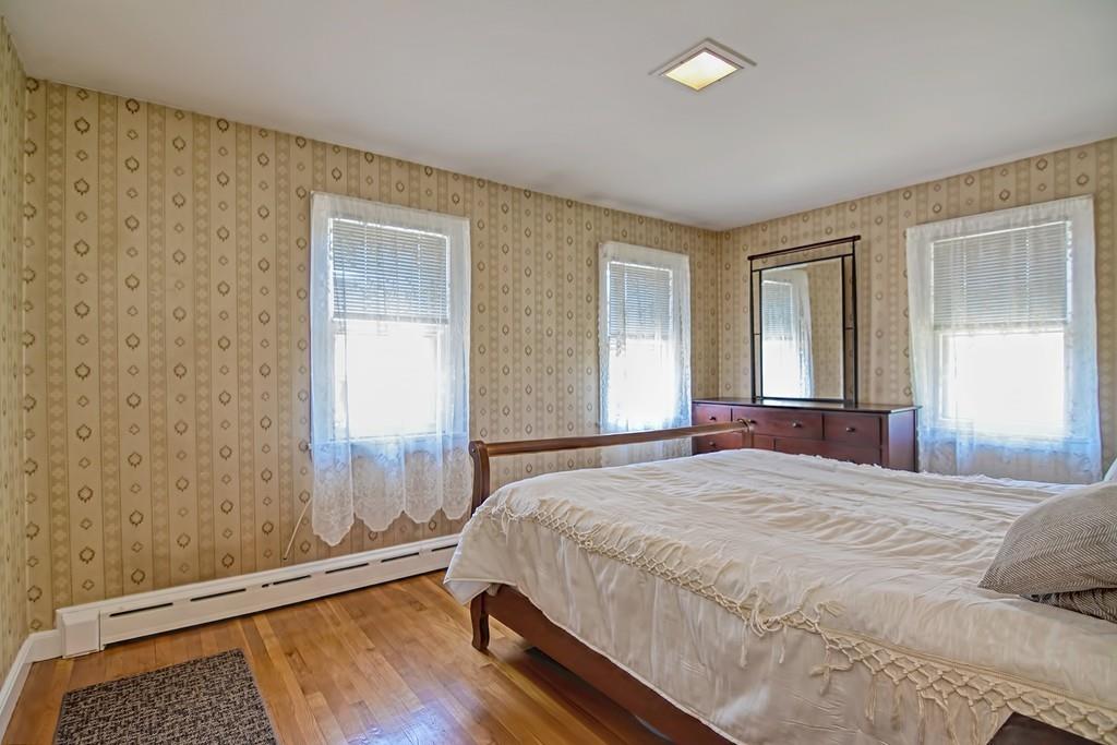 20 Westvale Road Medford, MA 02155 - Photo 26 of 42 a bedroom with a bed and a window