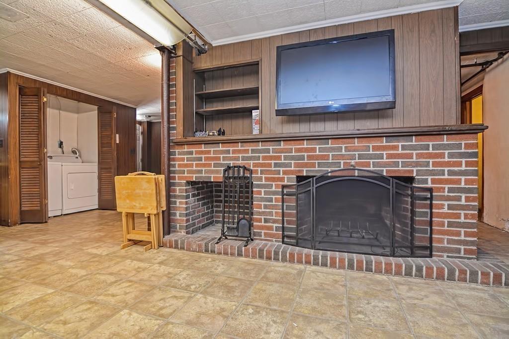 20 Westvale Road Medford, MA 02155 - Photo 30 of 42 a view of fireplace and window in an empty room