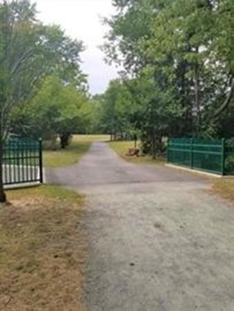 20 Westvale Road Medford, MA 02155 - Photo 40 of 42 a view of dirt yard with trees