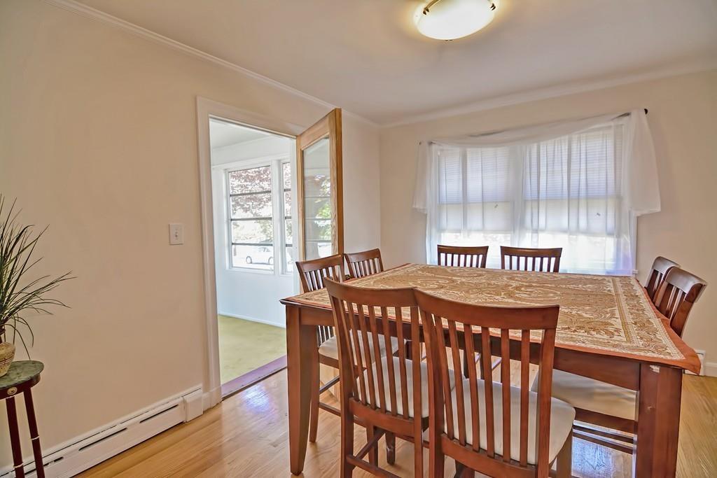 20 Westvale Road Medford, MA 02155 - Photo 10 of 42 a bedroom with a bed and wooden floor