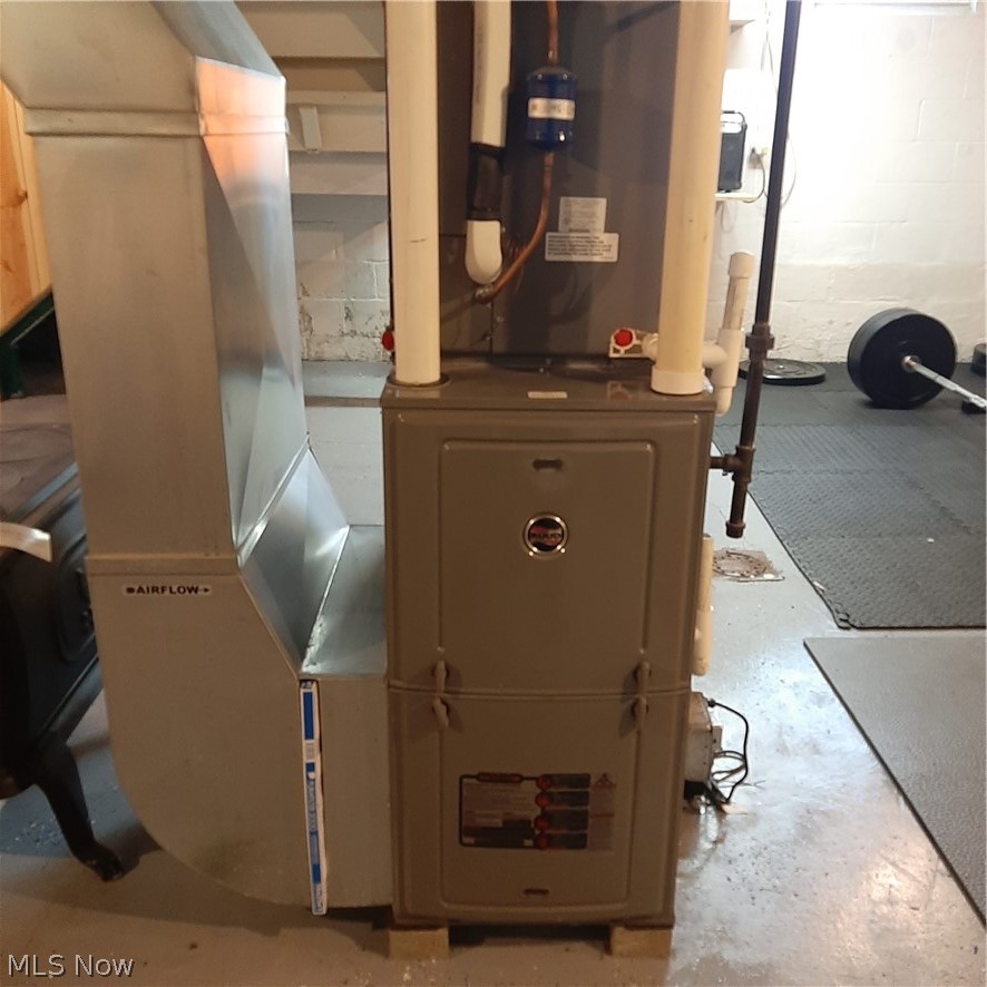 8599 Bryron Lin Road Mineral Ridge, OH 44440 - Photo 27 of 31 Hi-efficiency propane furnace can be converted to natural gas if ever needed