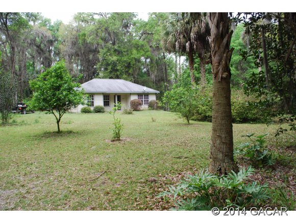 22868 Northwest 91st Court Road Micanopy, FL 32667 - Photo 1 of 12 Front of House