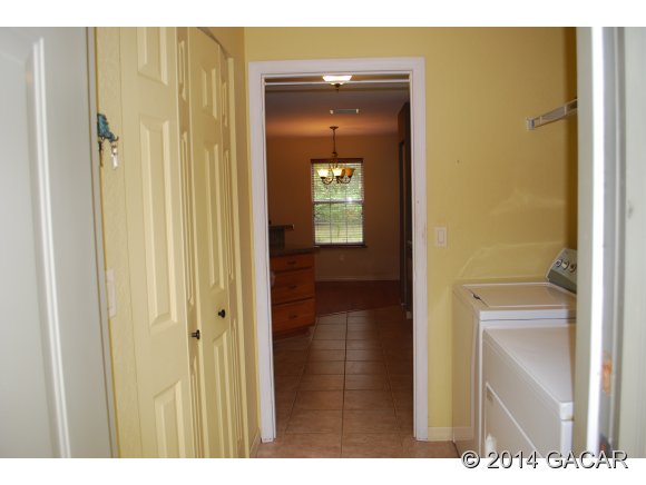 22868 Northwest 91st Court Road Micanopy, FL 32667 - Photo 3 of 12 Laundry Room