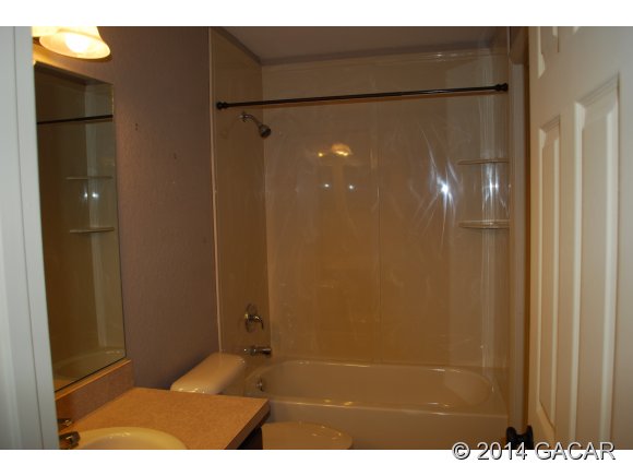 22868 Northwest 91st Court Road Micanopy, FL 32667 - Photo 4 of 12 Bathroom
