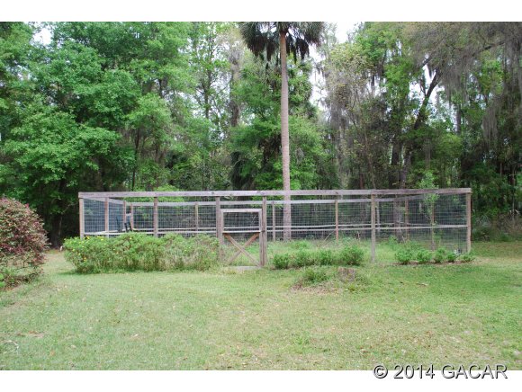 22868 Northwest 91st Court Road Micanopy, FL 32667 - Photo 6 of 12 Garden