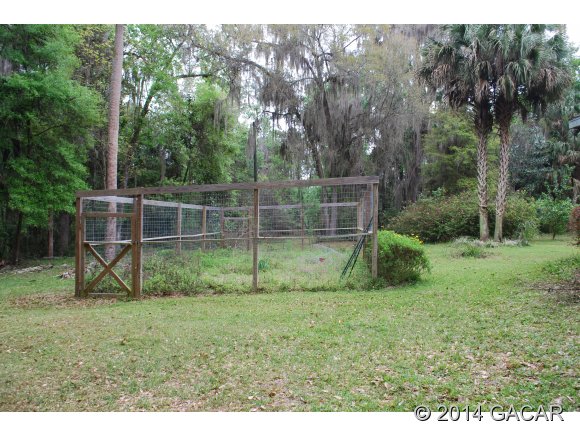 22868 Northwest 91st Court Road Micanopy, FL 32667 - Photo 7 of 12 Garden