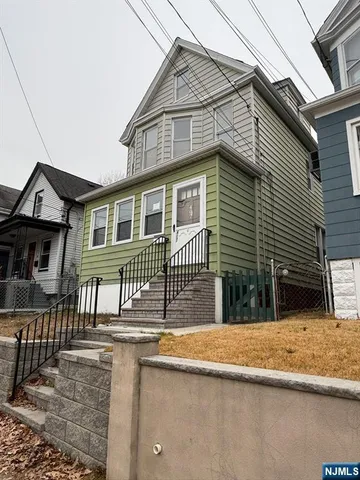 a front view of a house with balcony