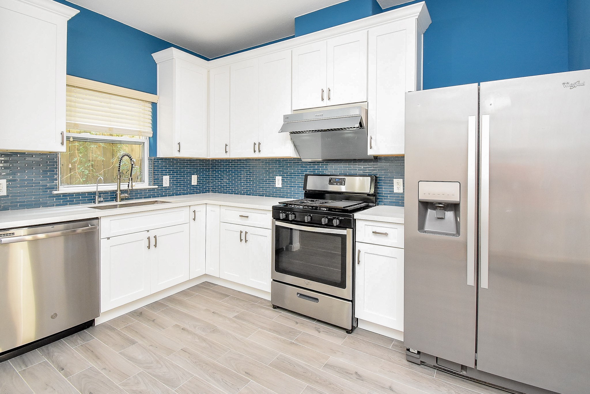 2202 Naomi Street, Unit 3 Houston, TX 77054 - Photo 12 of 42 a white refrigerator freezer sitting inside of a kitchen