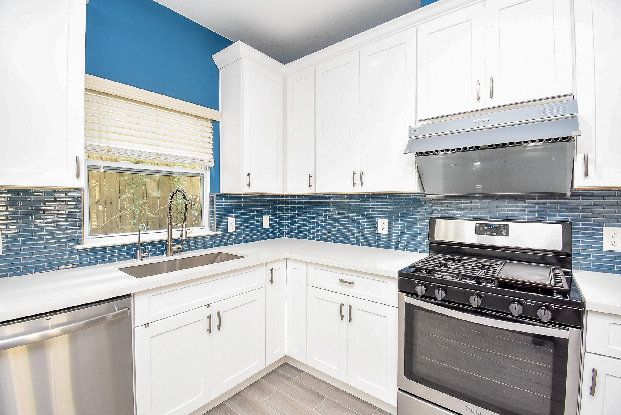 2202 Naomi Street, Unit 3 Houston, TX 77054 - Photo 13 of 42 a kitchen with a stove and a sink