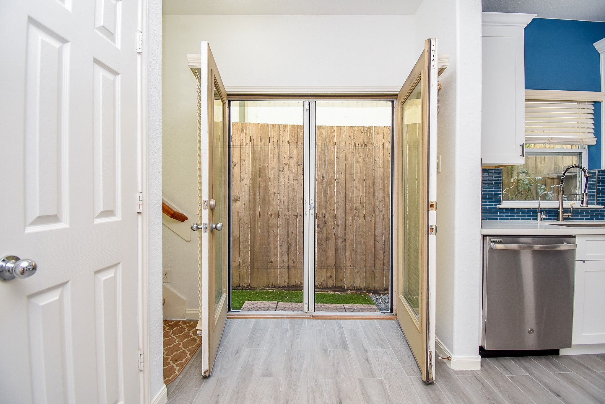 2202 Naomi Street, Unit 3 Houston, TX 77054 - Photo 19 of 42 a view of a hallway with wooden floor and a room