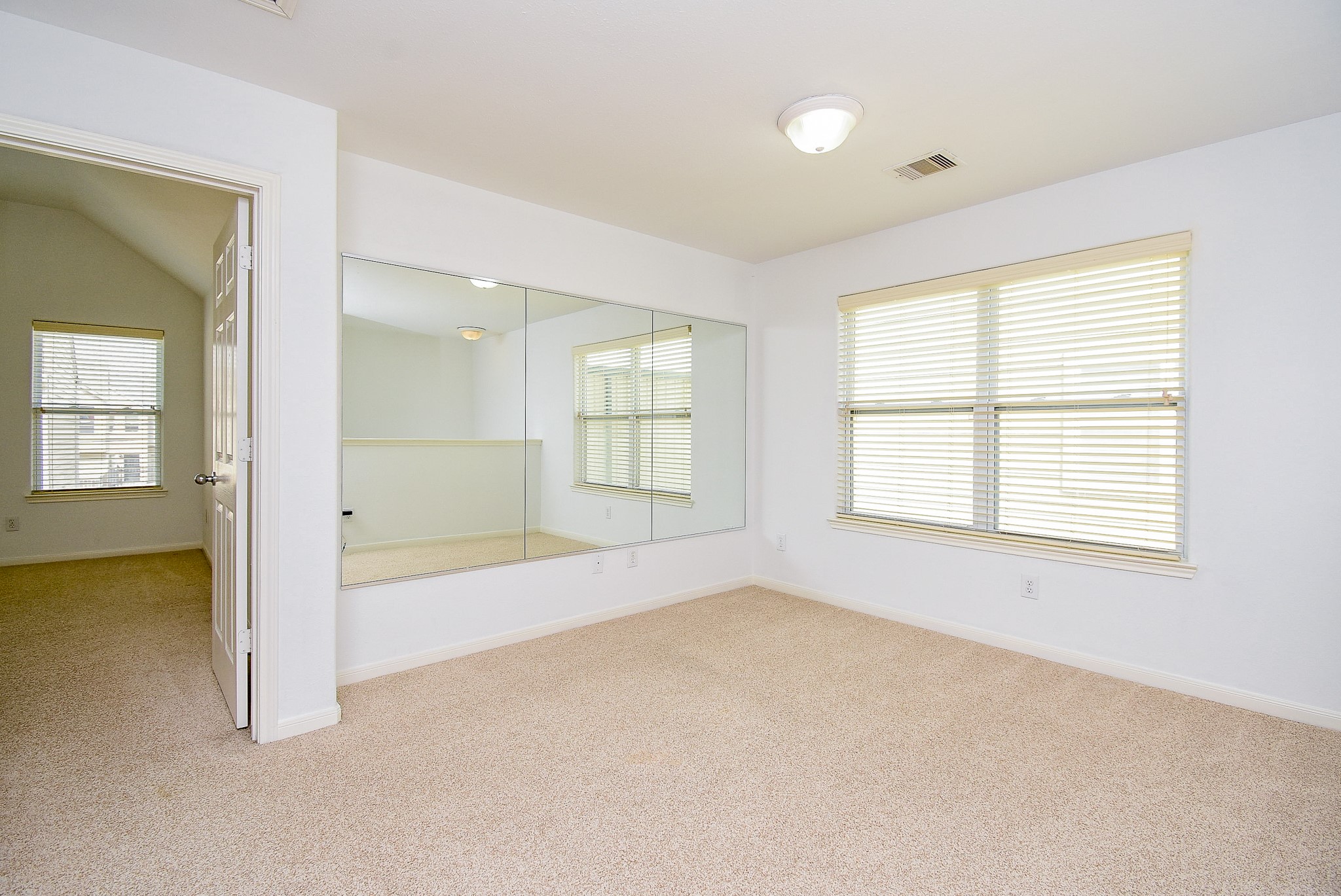 2202 Naomi Street, Unit 3 Houston, TX 77054 - Photo 21 of 42 a view of an empty room with a window