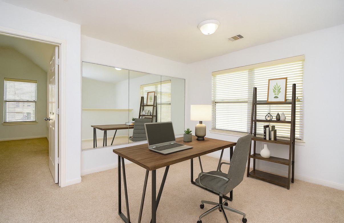 2202 Naomi Street, Unit 3 Houston, TX 77054 - Photo 22 of 42 a view of a workspace with furniture and a window
