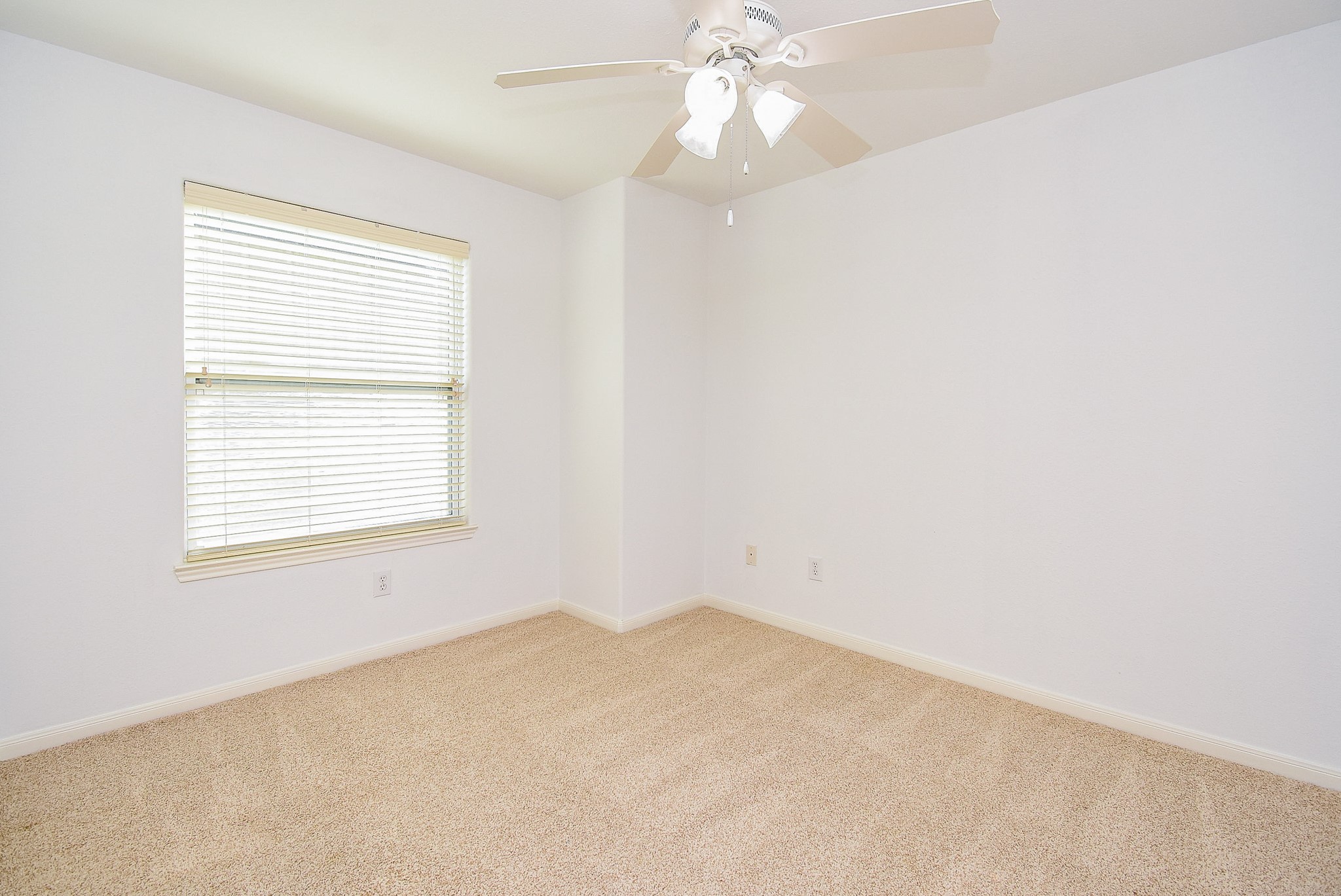 2202 Naomi Street, Unit 3 Houston, TX 77054 - Photo 36 of 42 an empty room with a window and a fan