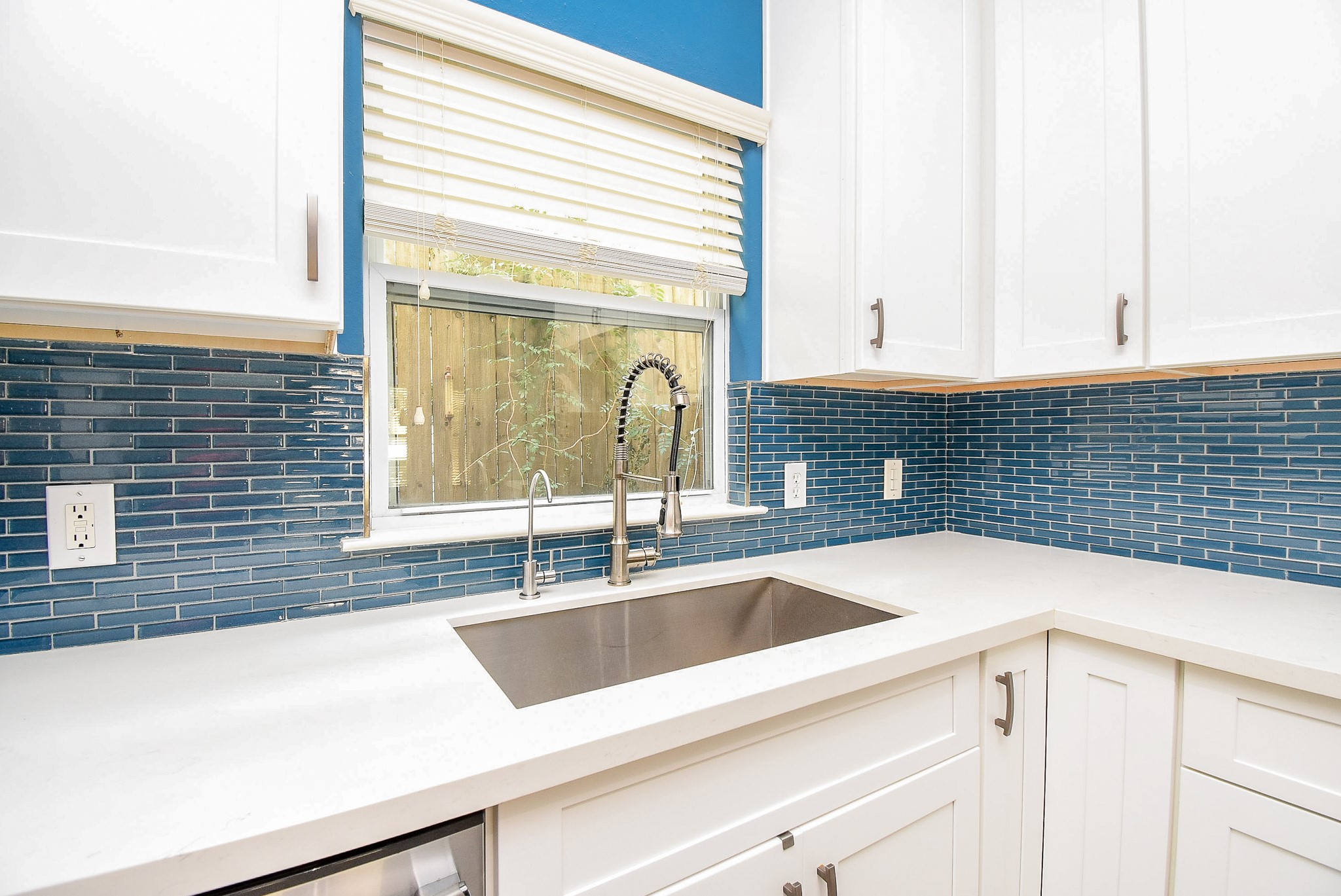 2202 Naomi Street, Unit 3 Houston, TX 77054 - Photo 7 of 42 a kitchen with granite countertop a sink and a window