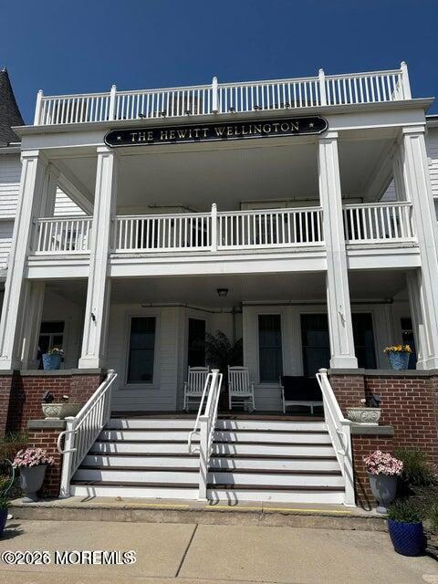200 Monmouth Avenue, Unit 21 Spring Lake, NJ 07762 - Photo 19 of 25 a view of a house with a balcony