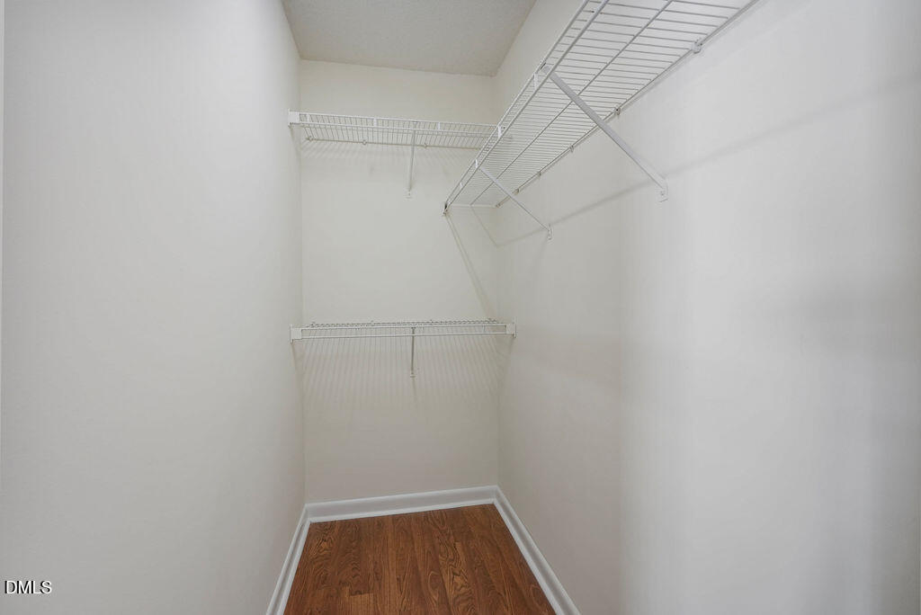 1411 Collegiate Circle, Unit 302 Raleigh, NC 27606 - Photo 13 of 43 a view of small space with racks on the wall