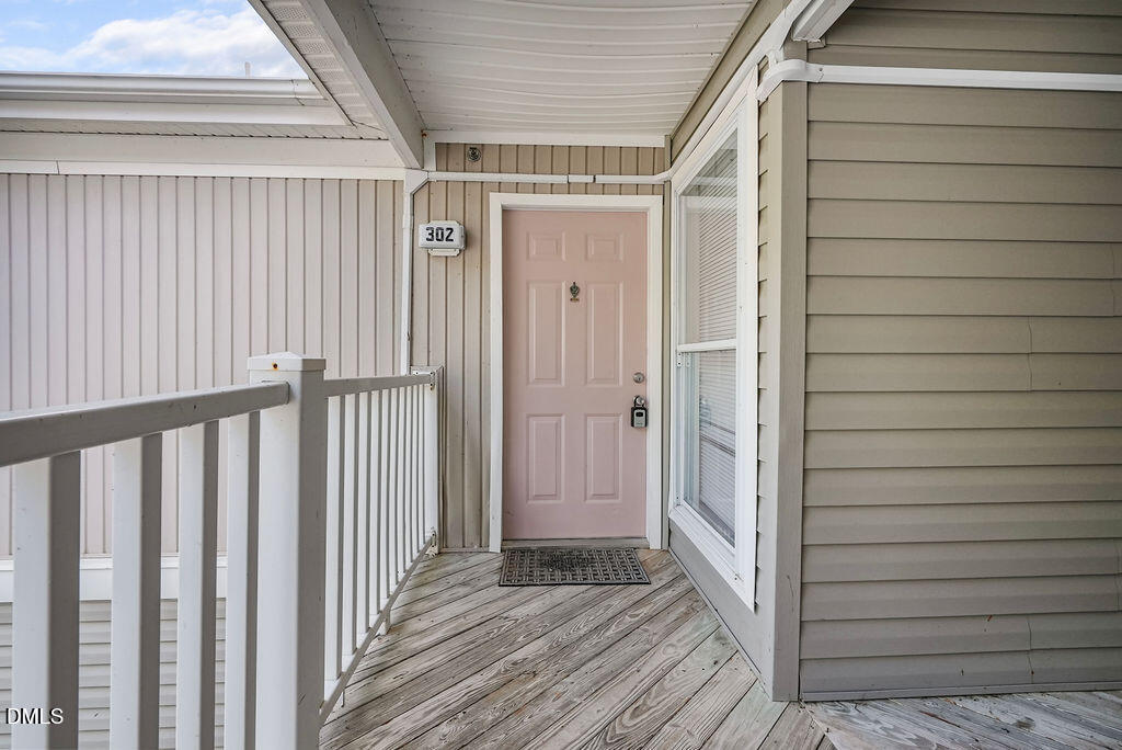 1411 Collegiate Circle, Unit 302 Raleigh, NC 27606 - Photo 37 of 43 a view of wooden door