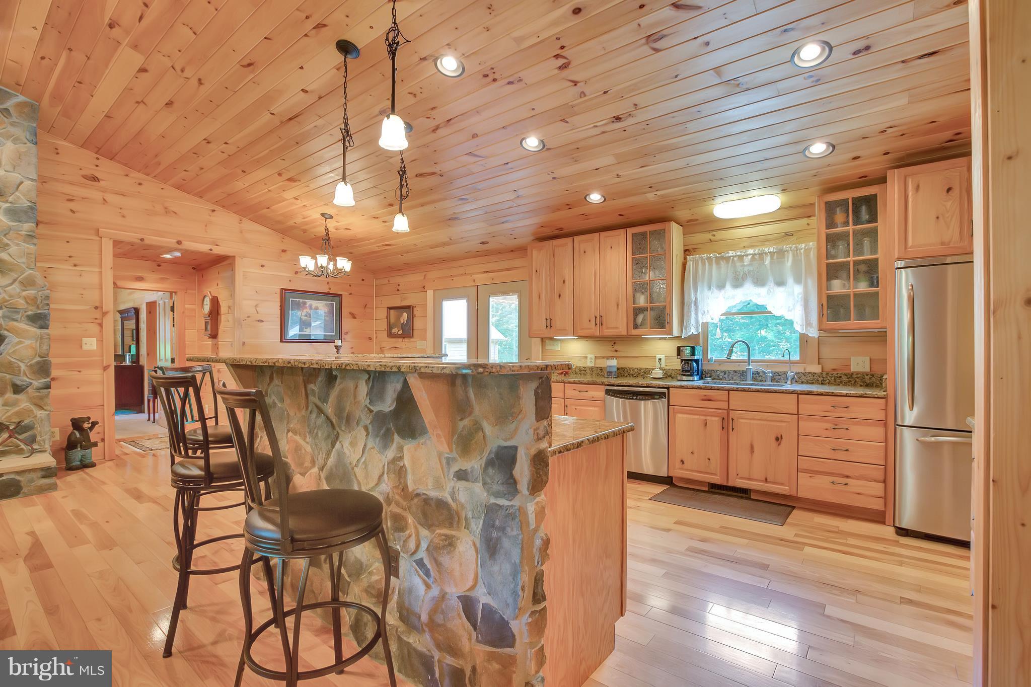 14311 Crawleys Dam Road Goldvein, VA 22720 - Photo 3 of 30 Gorgeous Stone Work Carries Throughout Home