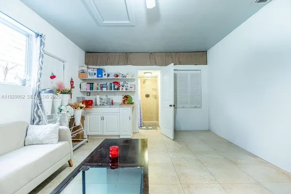 a room with toys and a chandelier