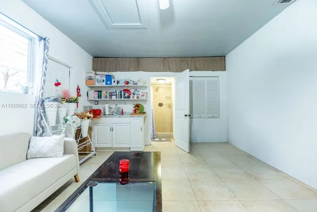 a room with toys and a chandelier