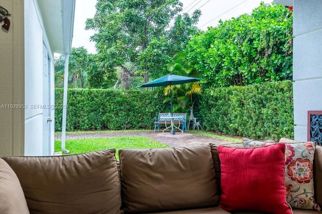 a view of a couches in a backyard