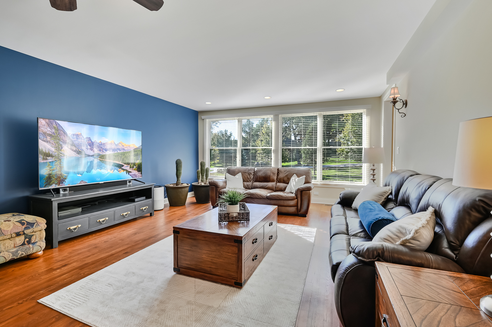 2 Carriage Lane Lemont, IL 60439 - Photo 12 of 44 a living room with furniture and a flat screen tv