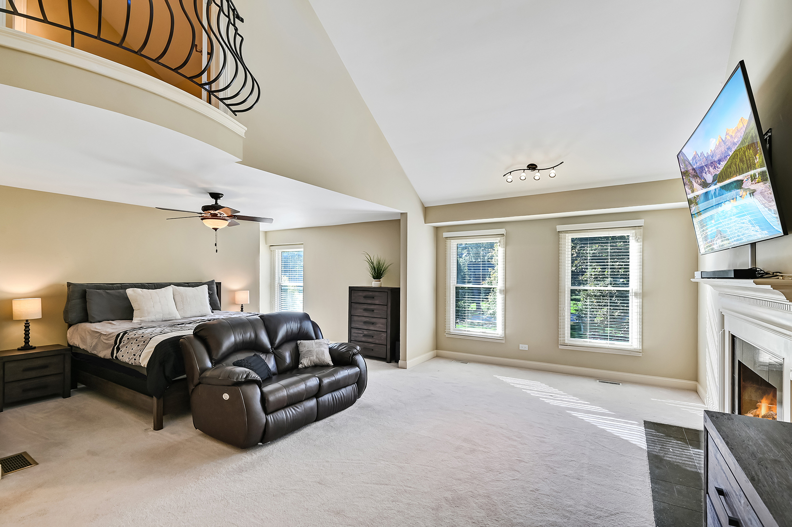 2 Carriage Lane Lemont, IL 60439 - Photo 16 of 44 a spacious bedroom with a bed and a flat screen tv