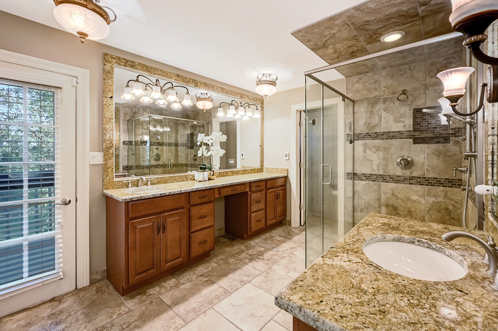 2 Carriage Lane Lemont, IL 60439 - Photo 19 of 44 a bathroom with a granite countertop sink mirror and shower