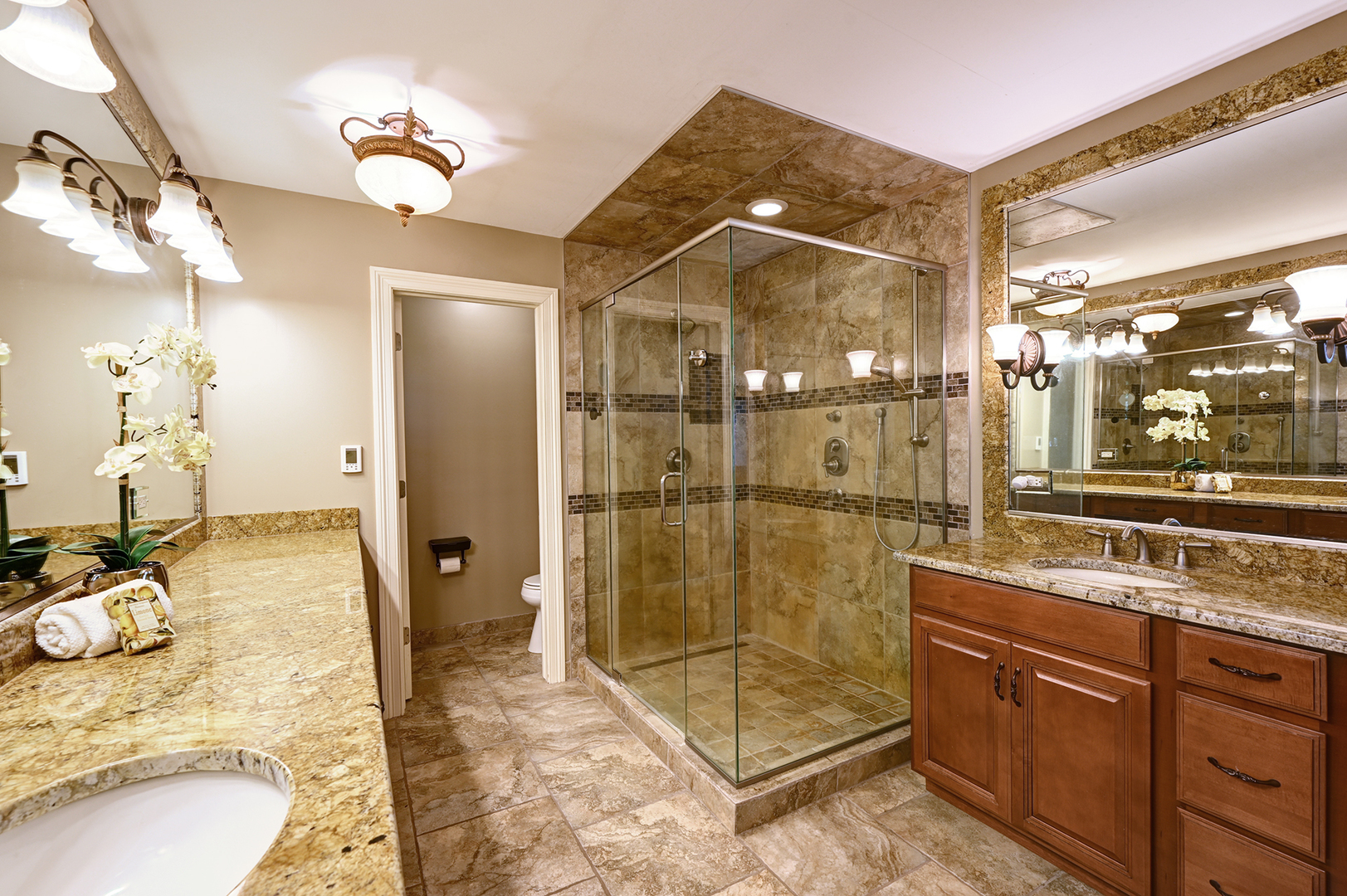 2 Carriage Lane Lemont, IL 60439 - Photo 20 of 44 a bathroom with a shower sink and mirror