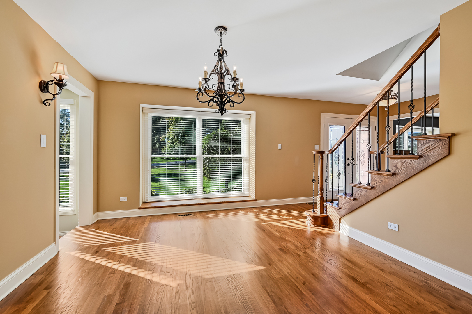 2 Carriage Lane Lemont, IL 60439 - Photo 8 of 44 a view of an entryway with wooden floor and door