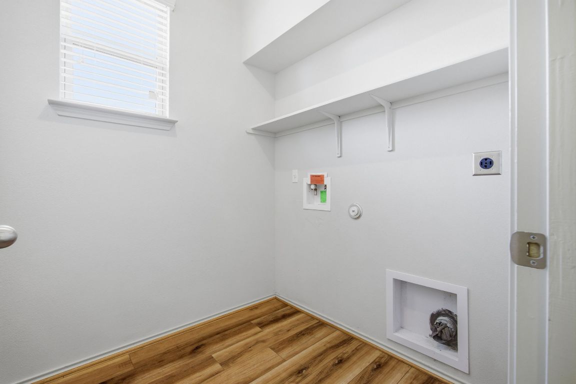 408 Azurite Drive Jarrell, TX 76537 - Photo 13 of 34 a view of small space with racks on the wall